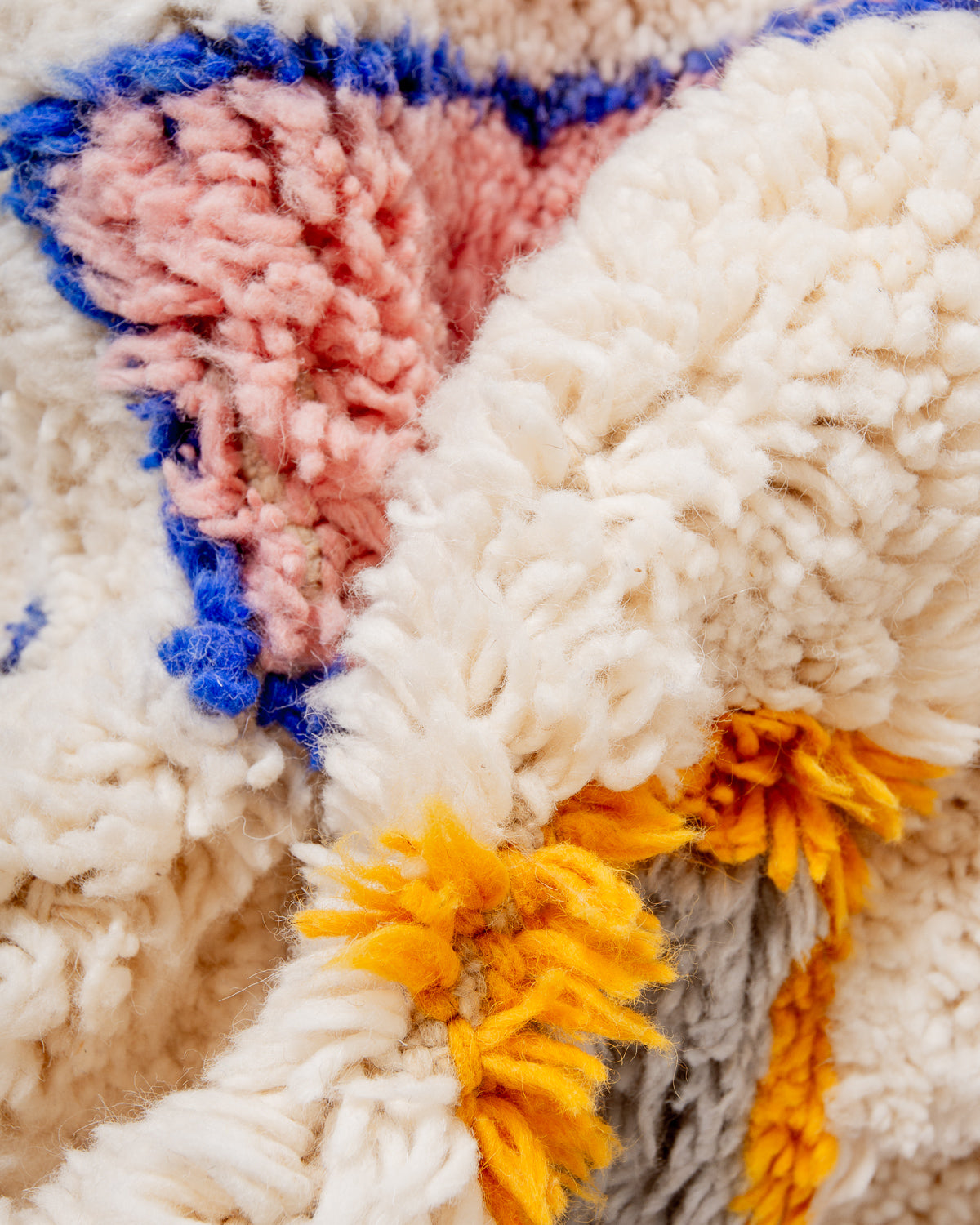 Modern, designer, handcrafted Berber rug from Morocco. Beniourain carpet with beautiful colours and patterns and fluffy wool texture.